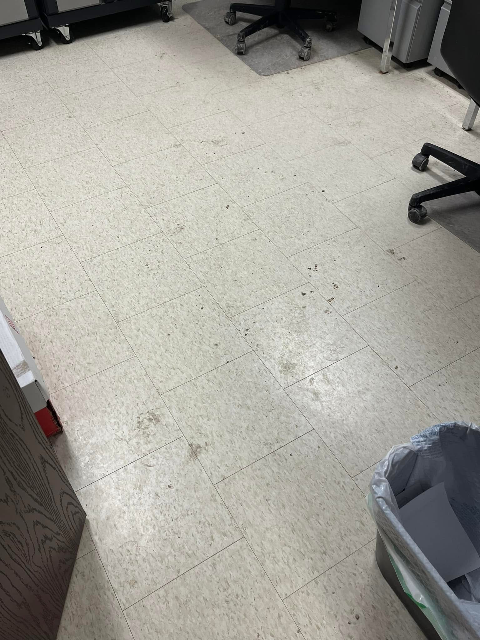 Office floor before cleaning