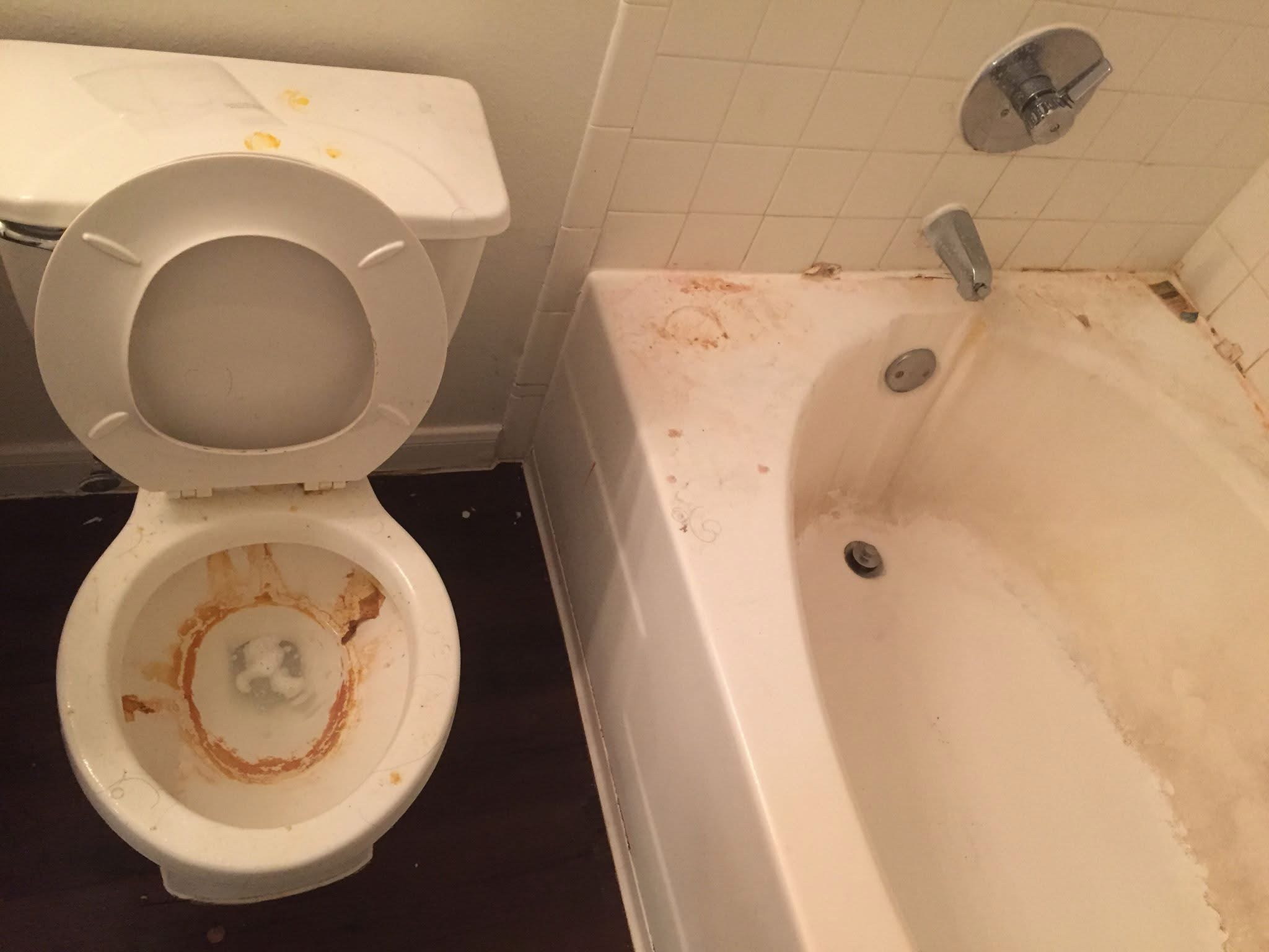 Heavily soiled bathroom before deep cleaning